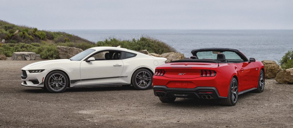 Red and white 2025 Ford Mustang on seaside